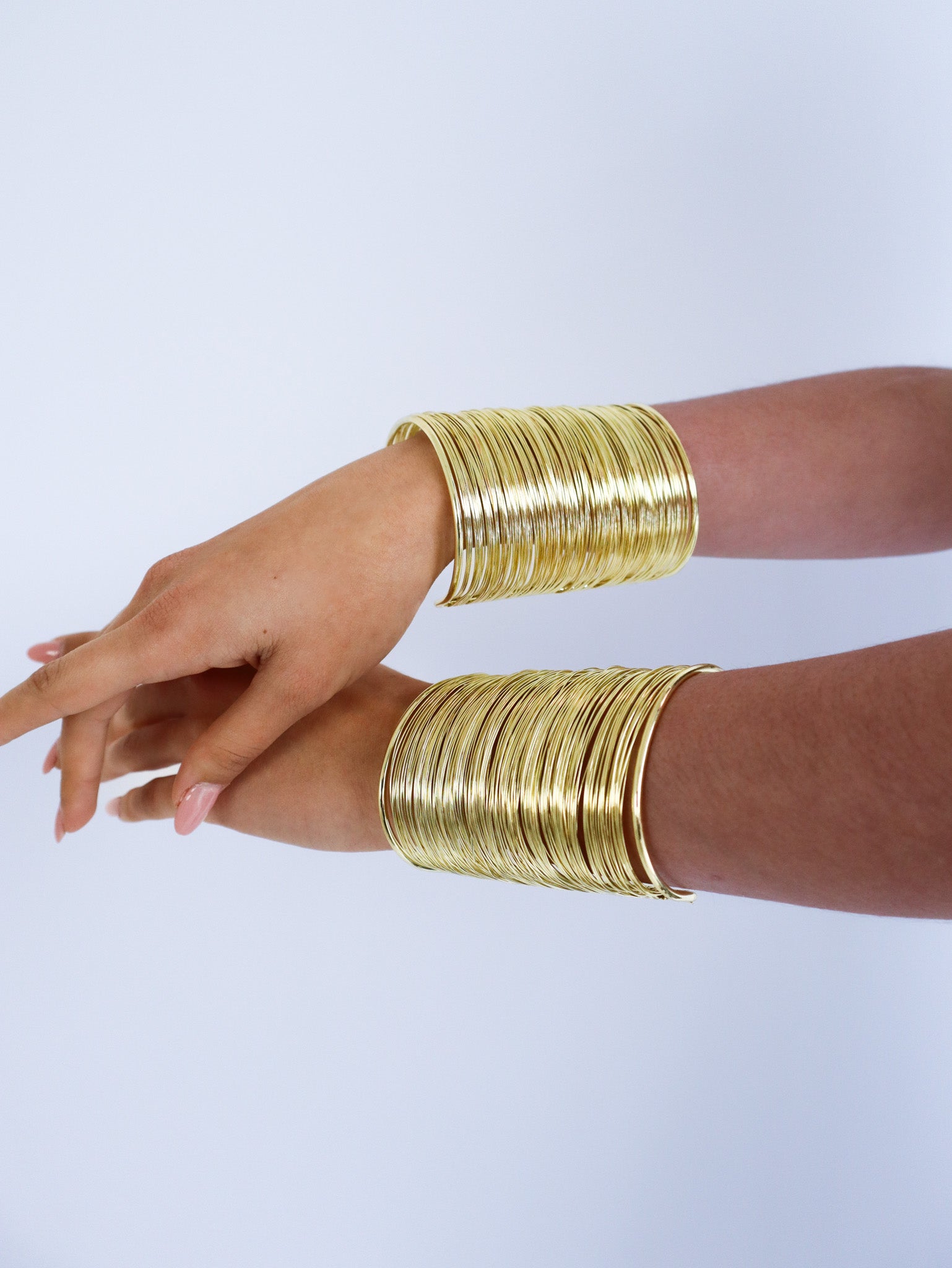 Bracciali rigidi gold multipli